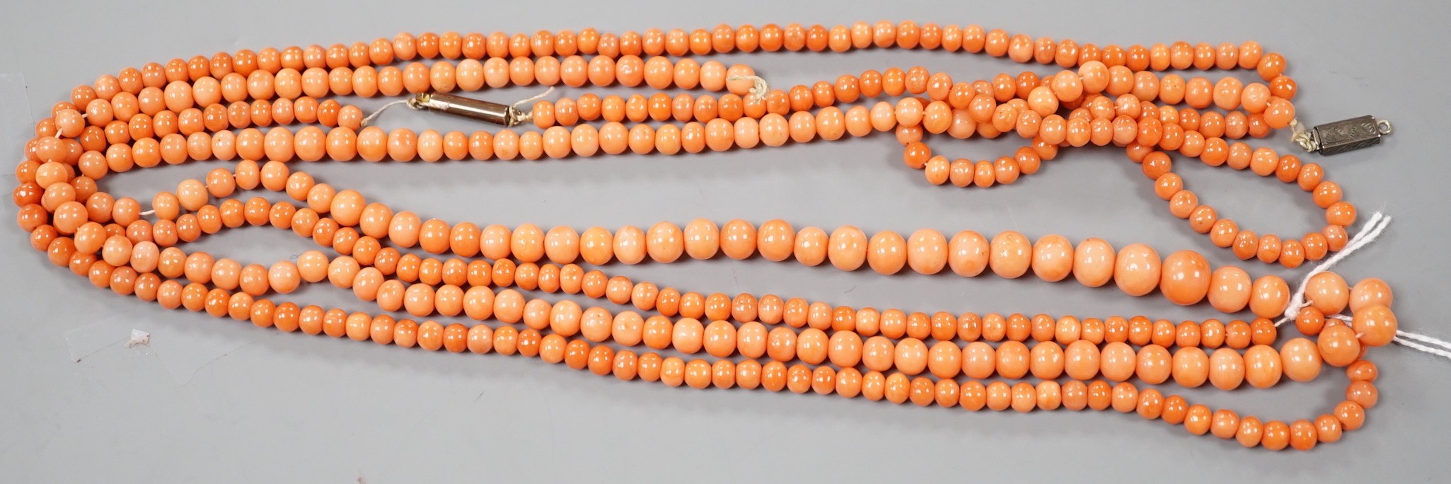 Two single strand coral bead necklaces, one a.f., longest 103cm.